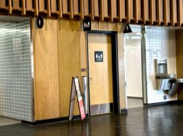 The outside of a single-person washroom in SFU’s academic quadrangle