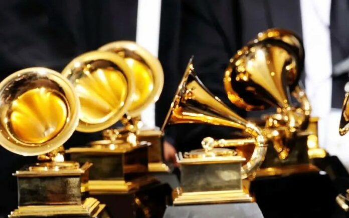 Multiple grammy awards on a table