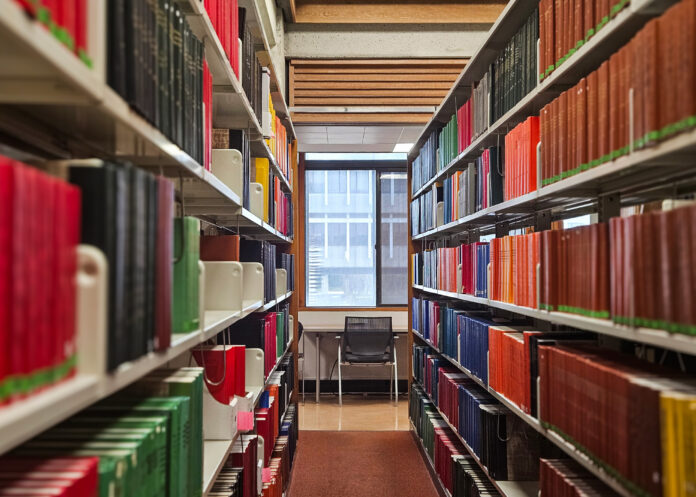Puneet-Aulakh_library-peaceful this photo is taken from in between library bookshelves and shows the perfect spot for taking a break