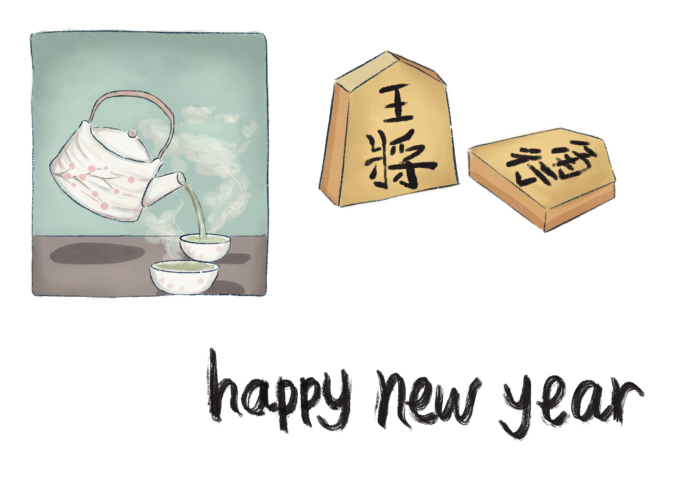A pot of green tea decorated with pink cherry blossoms is poured into two ceramic cups. Two shogi pieces sit above the words “happy new year” written in black brushstrokes.