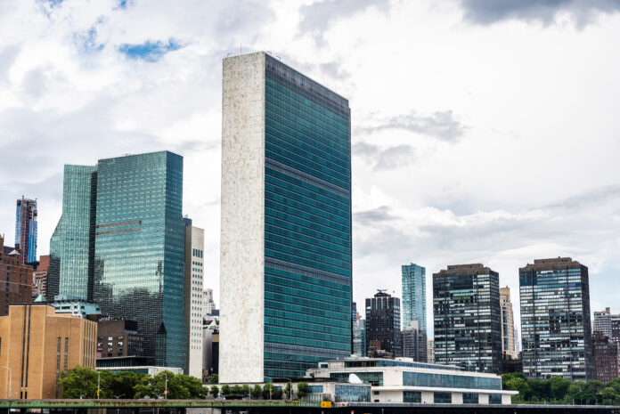Manhattan skyline in New York City, USA This is a photo of a tall UN building in the city.