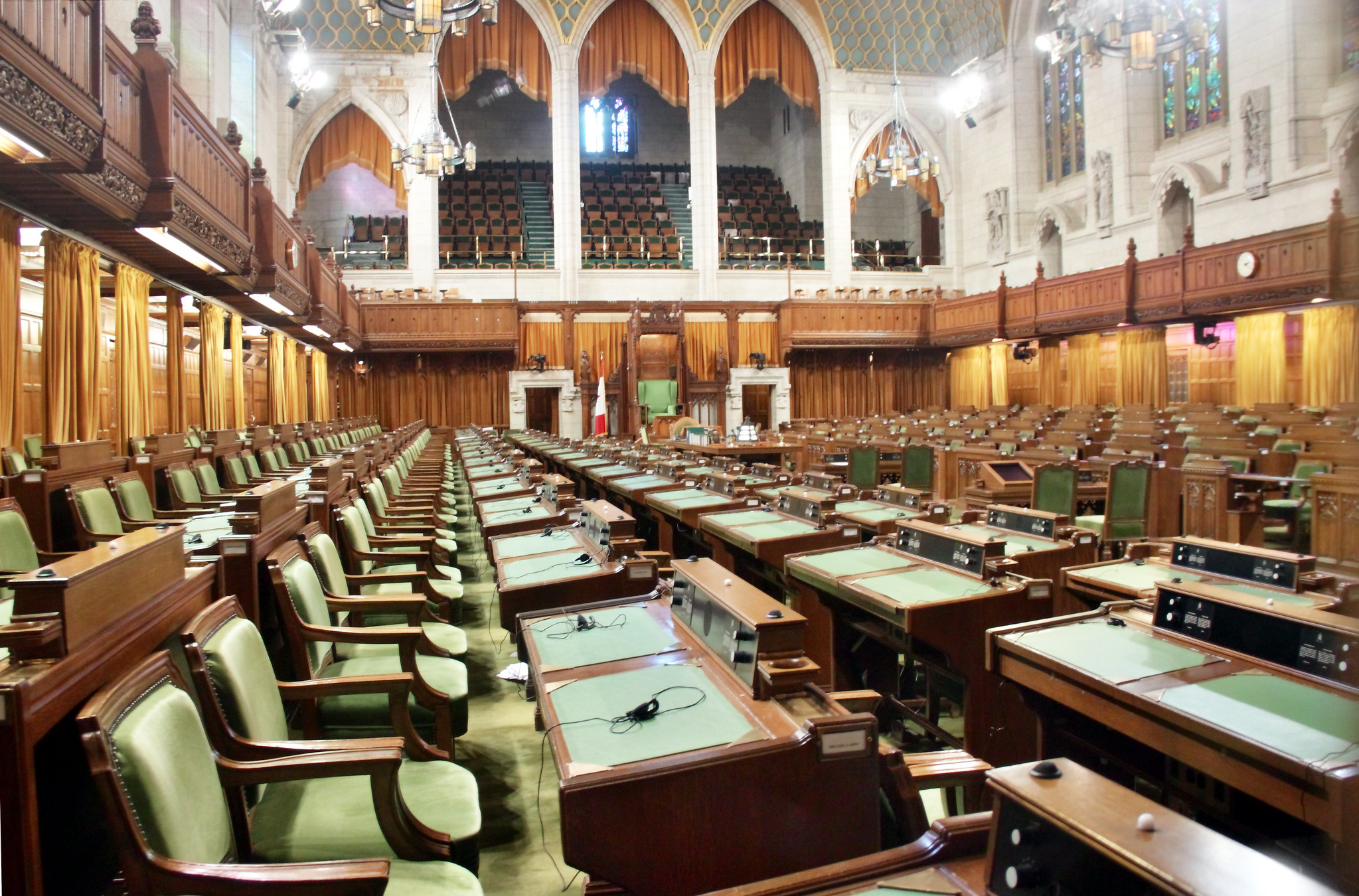 this picture is of the inside of the house of commons, and it is empty.