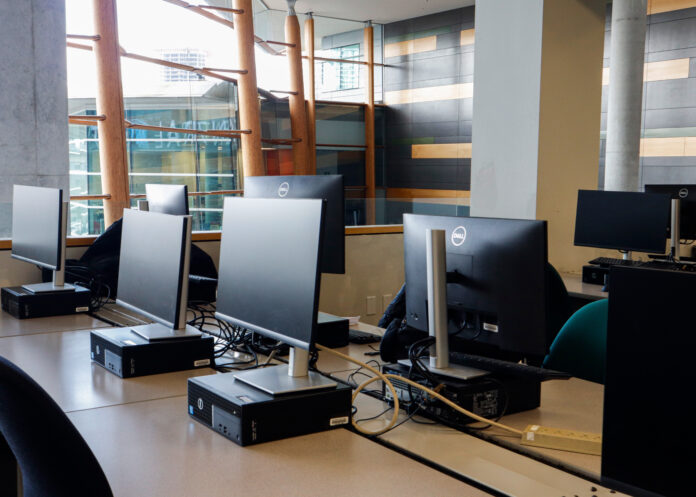 computer-lab_victoria-lo A closeup of a line of computers in a computer lab on campus.