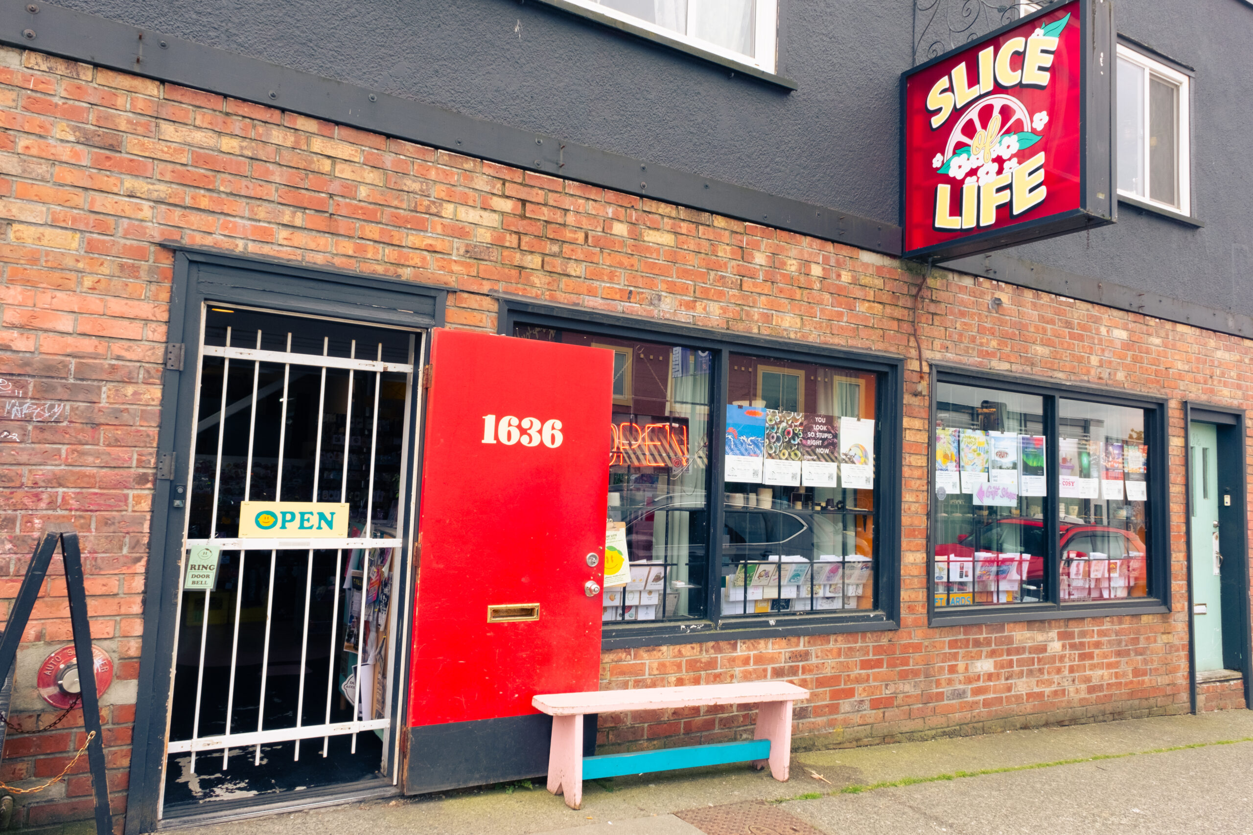 PHOTO: The exterior of the Slice of Life Photo Studio, including their sign at the entrance (address: 1636 Venables St, Vancouver, BC V5L 2H2).
