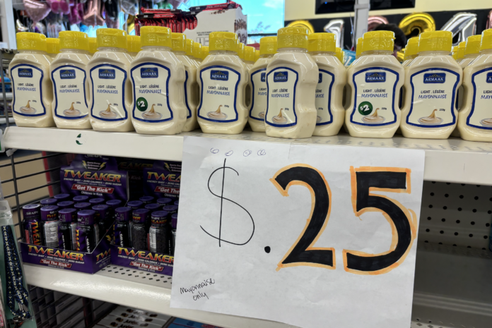 A picture of a row of mayonnaise jars priced at 25 cents.