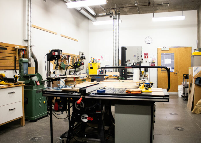 fabrication-lab_prerita-garg The photo shows the interior of the fabricommons at SFU Surrey at Fraser Library, including equipment such as sewing machines
