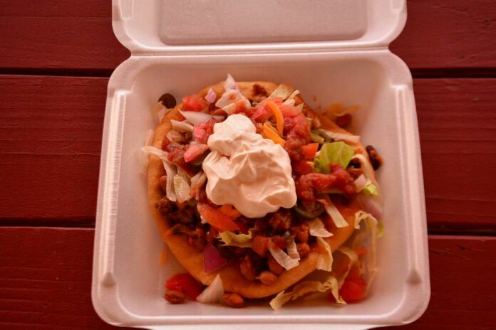 cc0_indian_taco This is an absolutely mouthwatering photo of an Indian taco inside a styrofoam container.