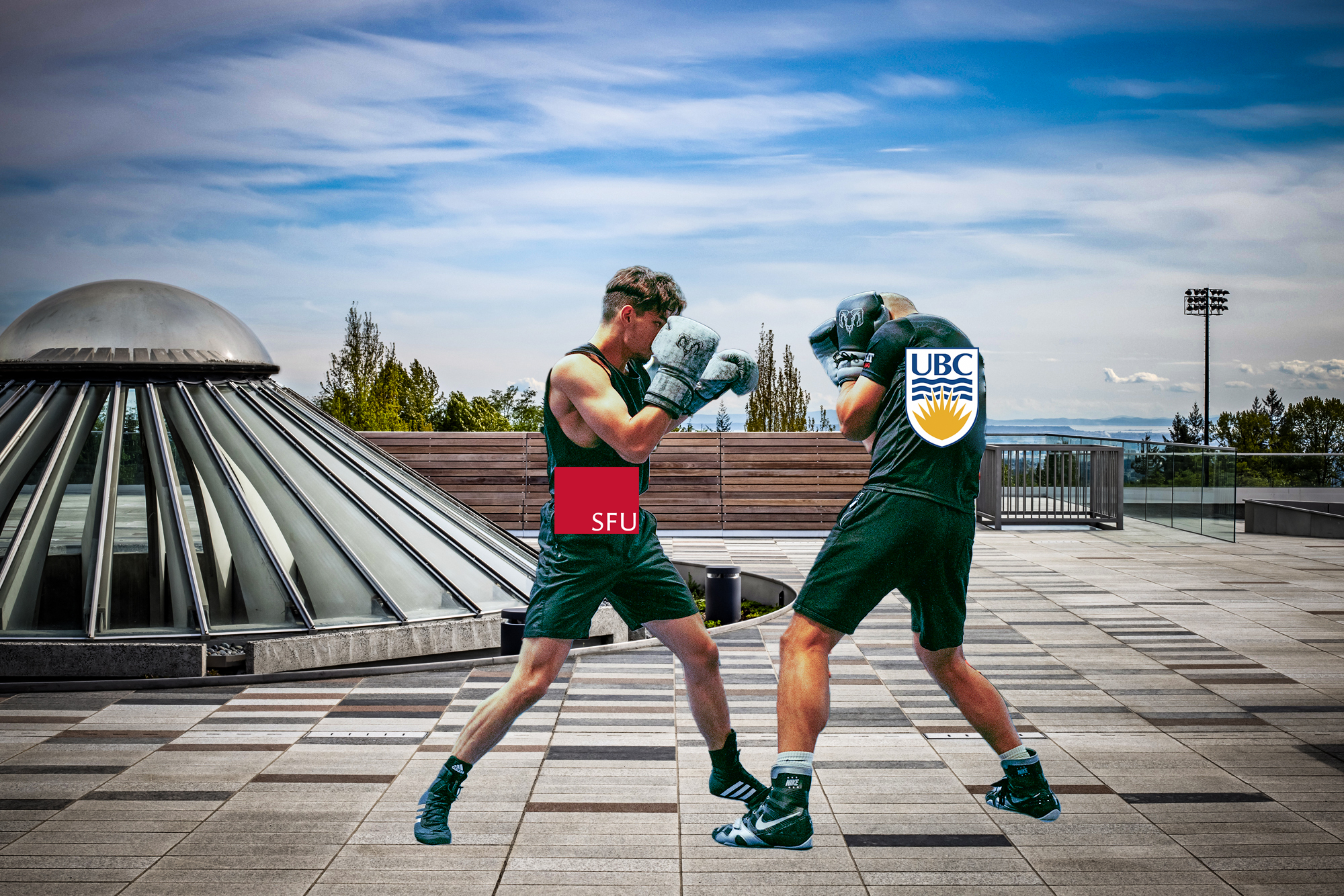 Two boxers representing SFU and UBC beefing it out on an sfu rooftop