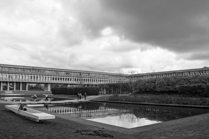 A black and white photo of the SFU reflecting pond.