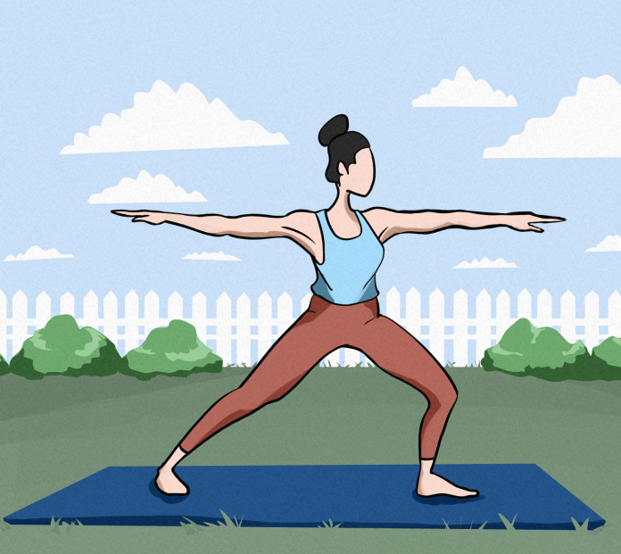 a person doing the warrior yoga pose in their back yard. The person is peaceful while connecting with their body and the environment.