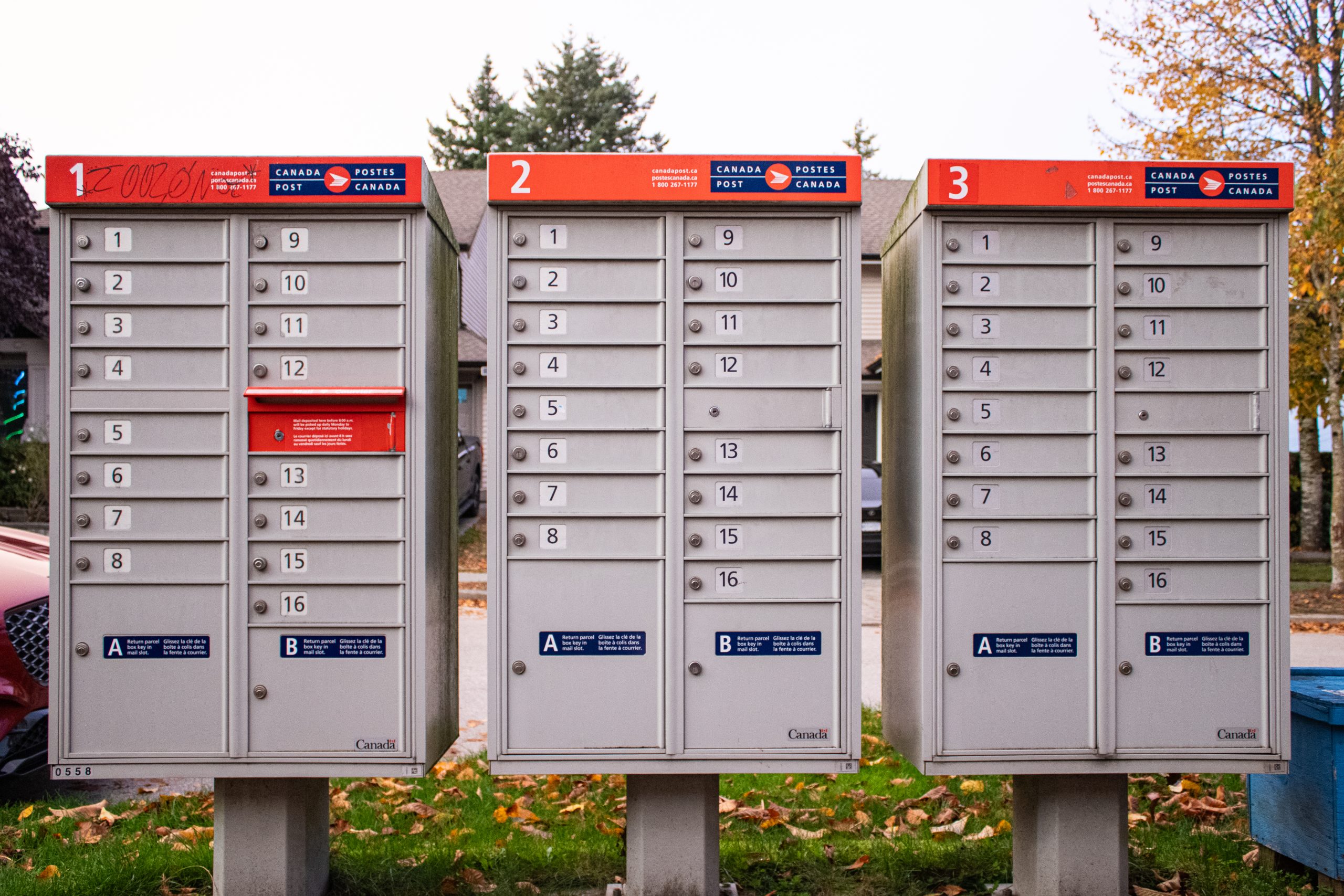 a photo of three Canada Post mailing boxes.