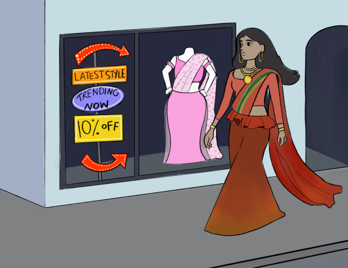 a woman walking down the street wearing an Osariya (saree) going past a shop with a sign that advertises a similar dress, but is advertised as a "new" thing.