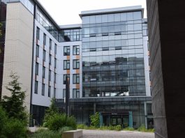 Environmental concerns lead Burnaby to reject off-campus student residence The outside of West Tower (SFU Residence building) stands tall on a cloudy day.