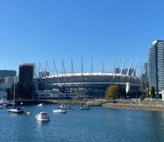Human rights calls for Canada Soccer to condemn the Israel Football Association The outside of BC Place and False Creek are pictured on a bright sunny day.