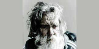 Life and growth are never linear Craggy-faced old man with an unkempt beard and hair