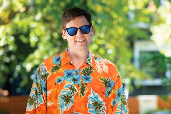 David Eby wearing a Hawaiian shirt and sunglasses.