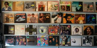 Bright-er Side: Music, space, and flipping a record over Multiple vinyl records organized in rows