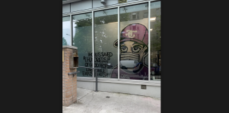 Thomus Donaghy overdose prevention site faces third closure in three years spraypainted art of Thomus Donaghy on the window of an Overdose Prevention Site