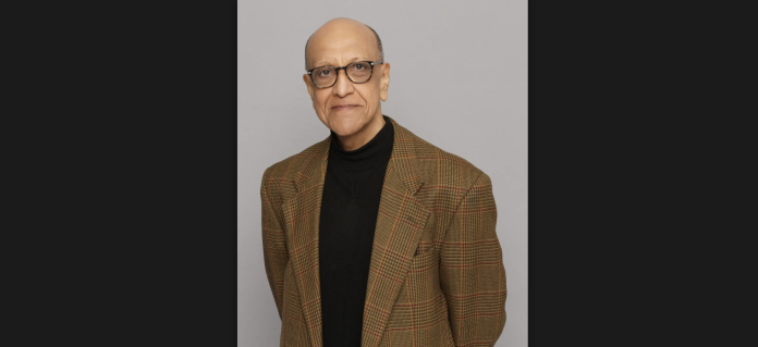 A headshot photo of Dr. Amyn Sajoo