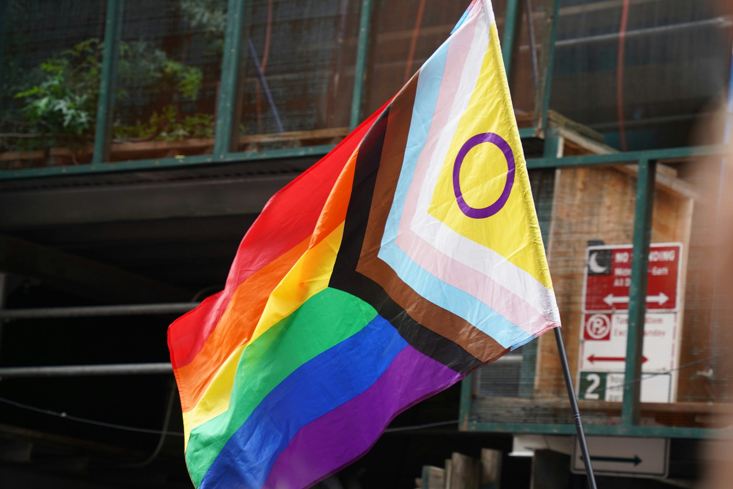 Photo of an updated Progress Pride Flag, which includes the intersex symbol