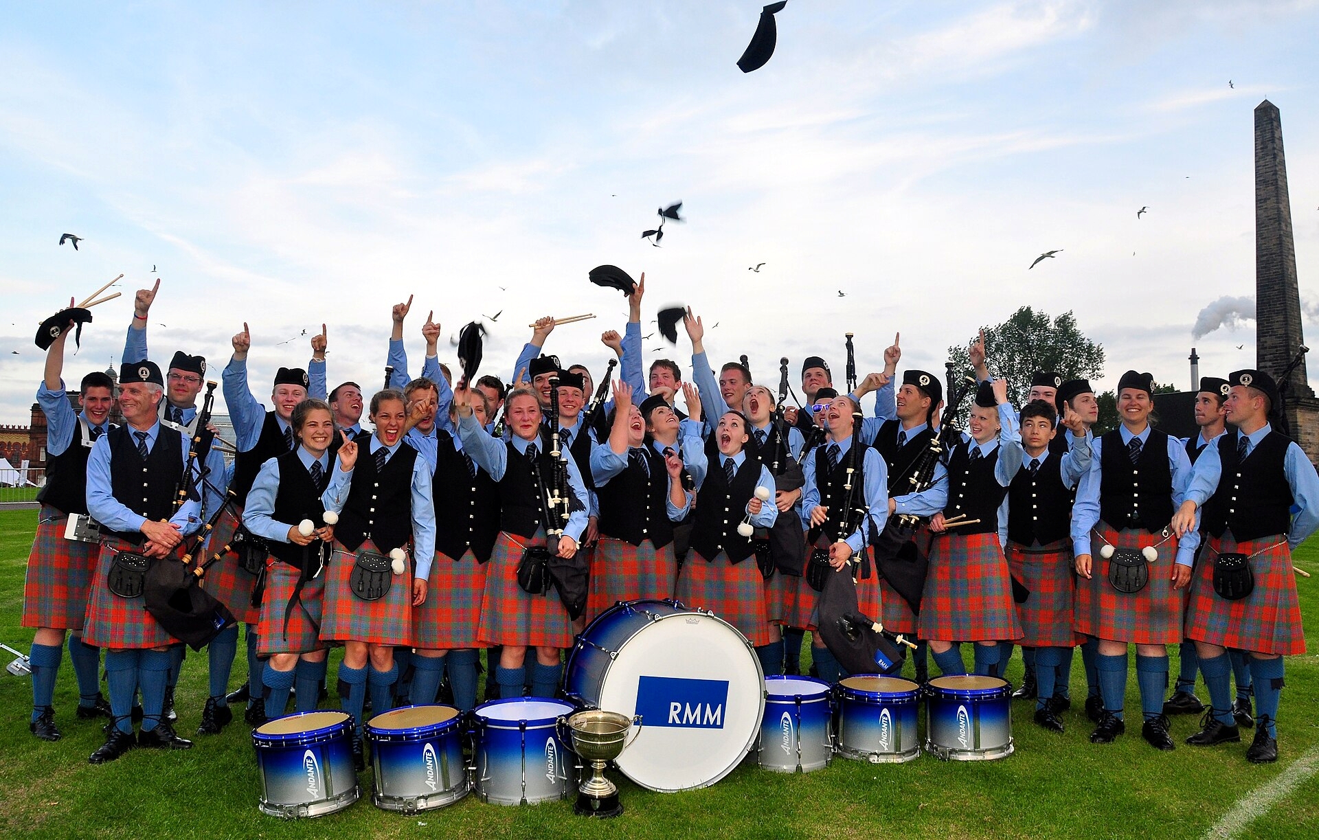 SFU Pipe Band pose for a picture, in uniform, after winning championship in 2009